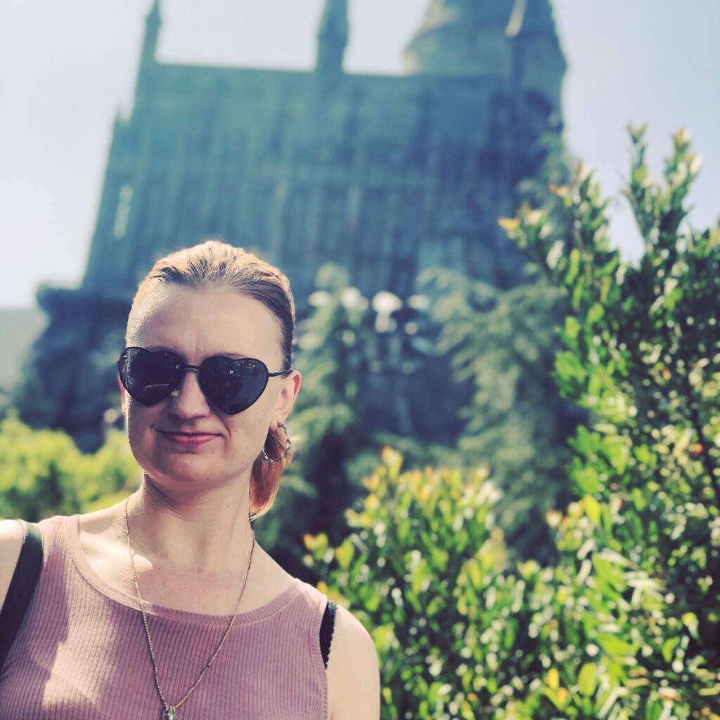 Ashley with sunglasses at Harry Potter World in Universal Studios
