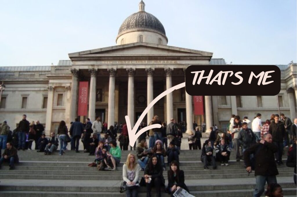 Ashley sitting on the steps in Trafalgar Square London